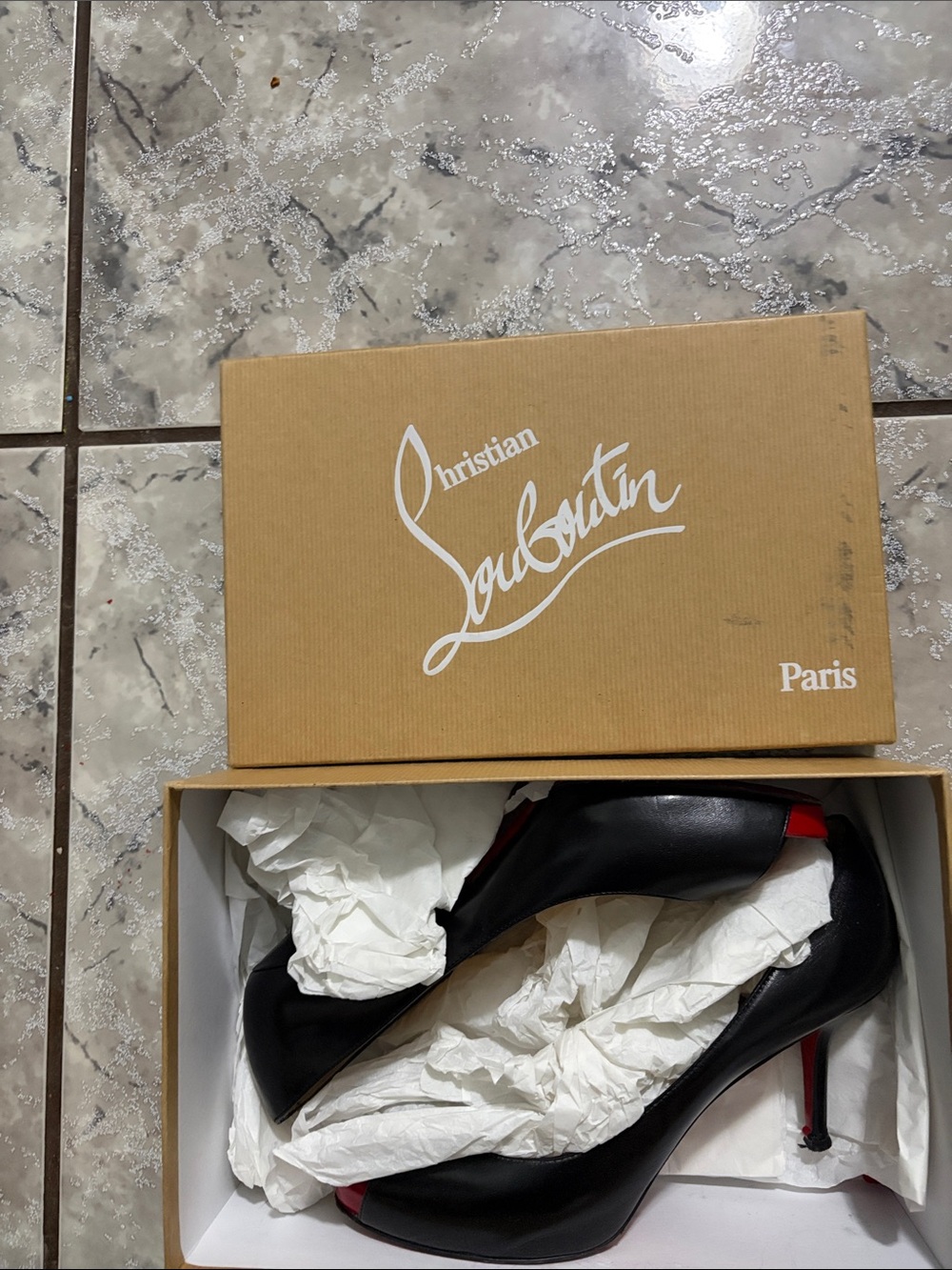 Christian Louboutin Black Leather Pumps with Red Soles and Accents